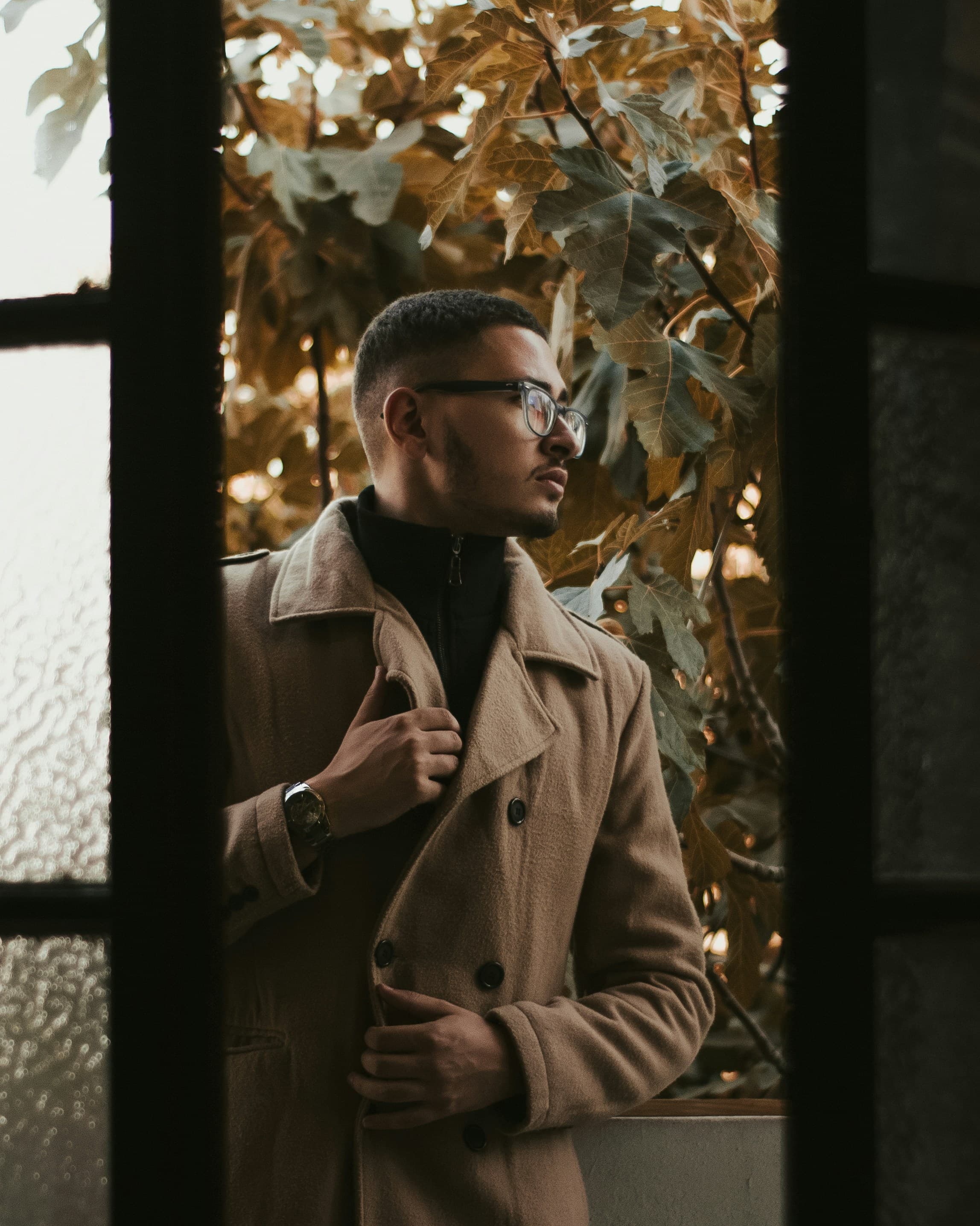 Picture of a man wearing yellowish autumn coat